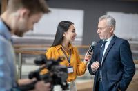 photo man being interviewed