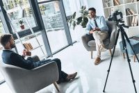 photo man interviewing